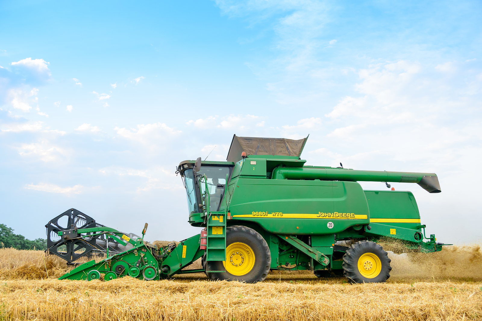 John Deere Combine Harvesting Wheat